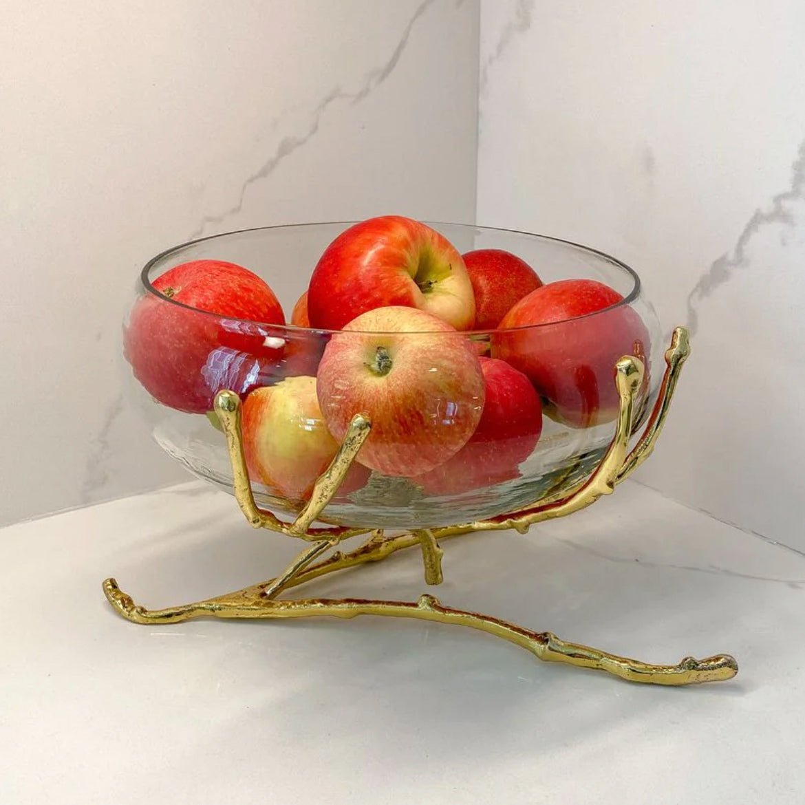 Luxury glass bowl with sculpted gold twig base – elegant centrepiece
Clear textured glass bowl on gold branch stand – decorative serveware
Luxury glass and gold twig bowl for fruits, salads, and home décor