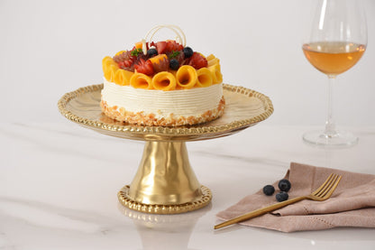 Monte Carlo matte gold porcelain cake stand with beaded rim
Luxury gold pedestal cake stand for cakes and desserts
Elegant matte gold serveware with sculpted gold beading
