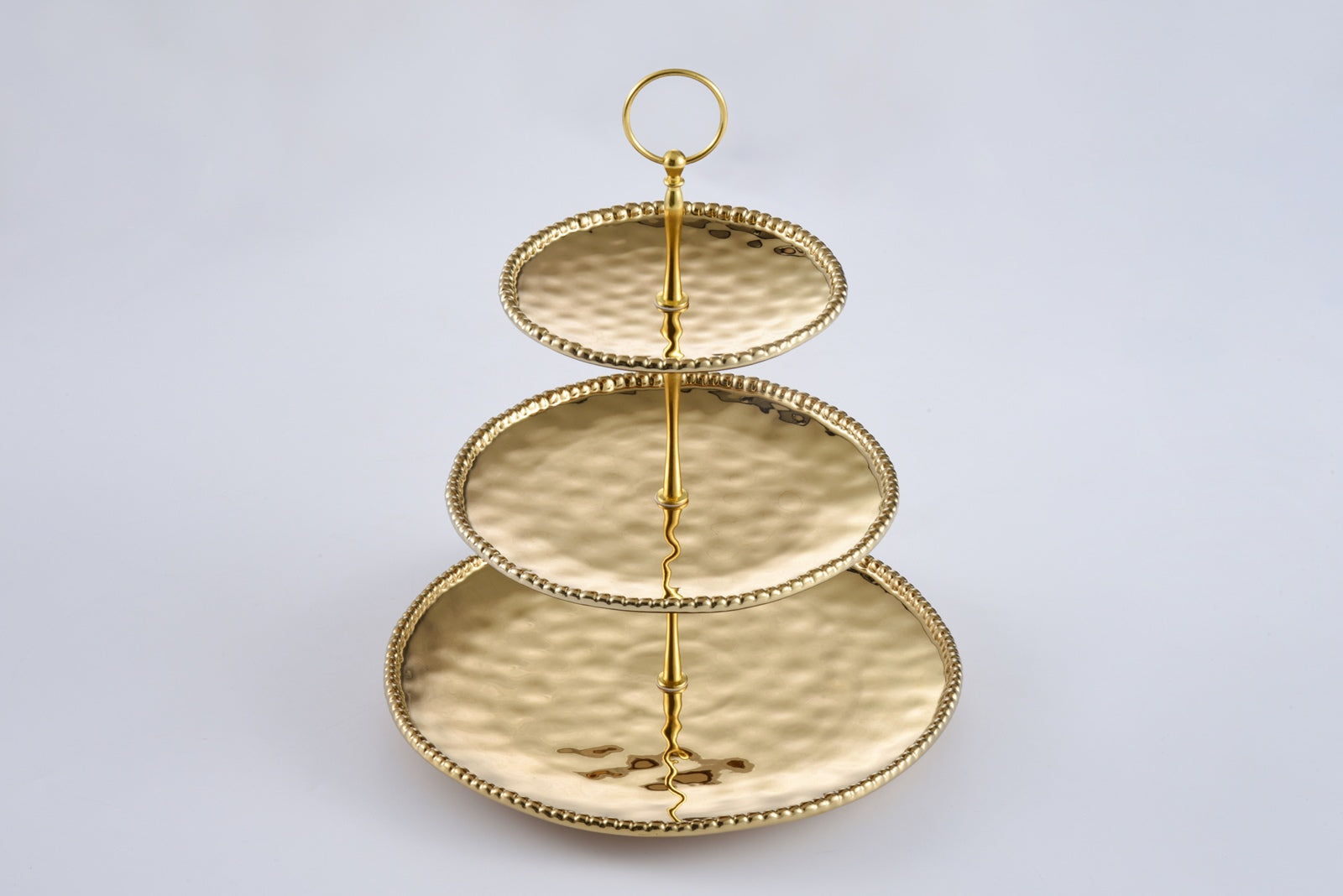 Monaco Cake Stand (3-Tier) – gold porcelain tiered stand by Pampa Bay

Luxury gold titanium 3-tier dessert stand with hammered finish

Elegant porcelain tiered cake stand from Monaco Collection
