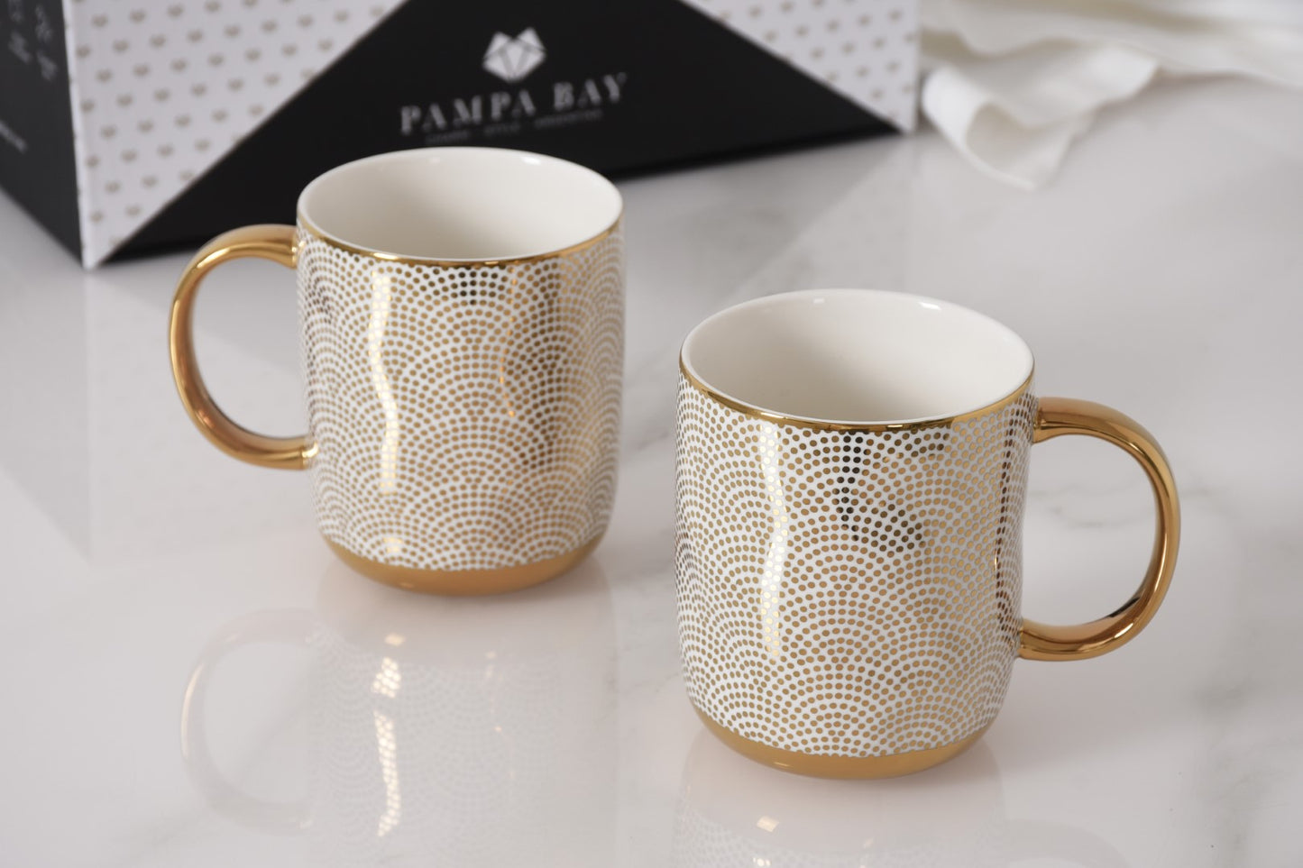 Pampa Bay Get Gifty Set of 2 Dotted Gold Porcelain Mugs in Gift Box

Luxury gold dotted porcelain mugs with gold handles

Elegant Pampa Bay mug gift set for coffee and tea