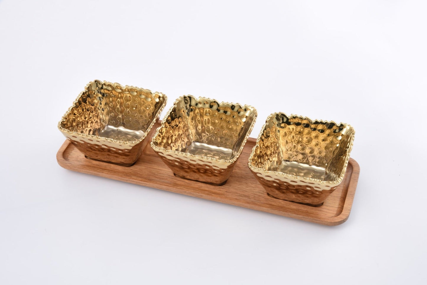 Golden Millennium 4-Piece Entertaining Set – gold porcelain snack bowls on acacia tray

Luxury gold titanium porcelain serving set with wooden tray

Pampa Bay Golden Millennium 4-Piece Entertaining Set — three hammered gold titanium porcelain snack bowls with acacia wood serving tray