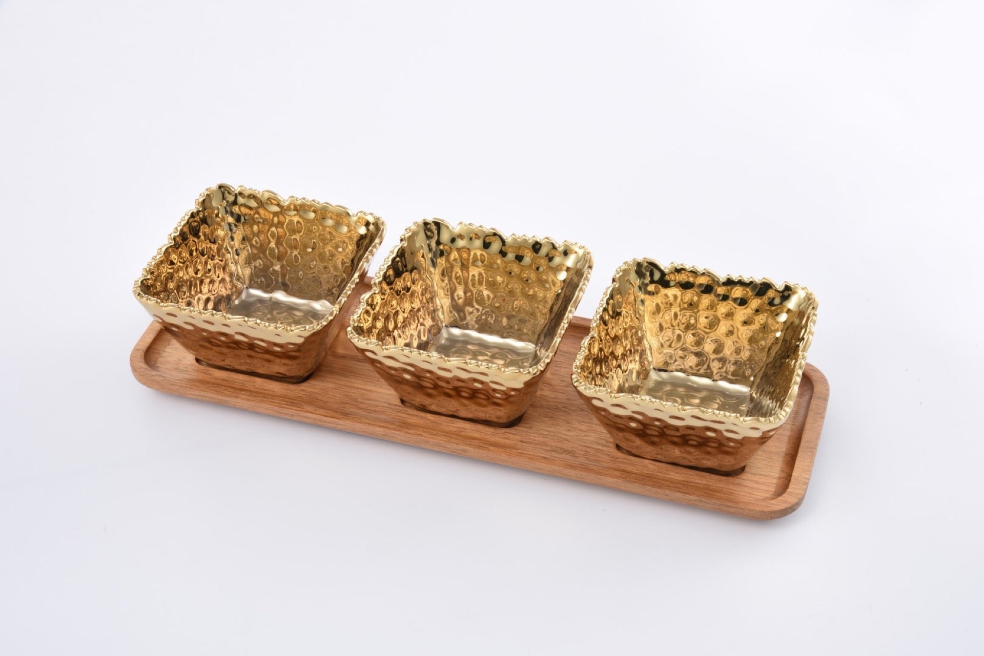 Golden Millennium 4-Piece Entertaining Set – gold porcelain snack bowls on acacia tray

Luxury gold titanium porcelain serving set with wooden tray

Pampa Bay Golden Millennium 4-Piece Entertaining Set — three hammered gold titanium porcelain snack bowls with acacia wood serving tray