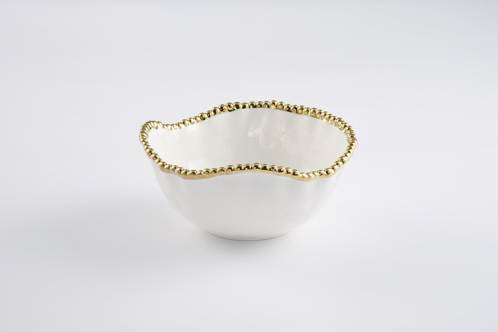 Pampa Bay Golden Salerno Medium Bowl — white porcelain serving bowl with gold titanium beaded rim
