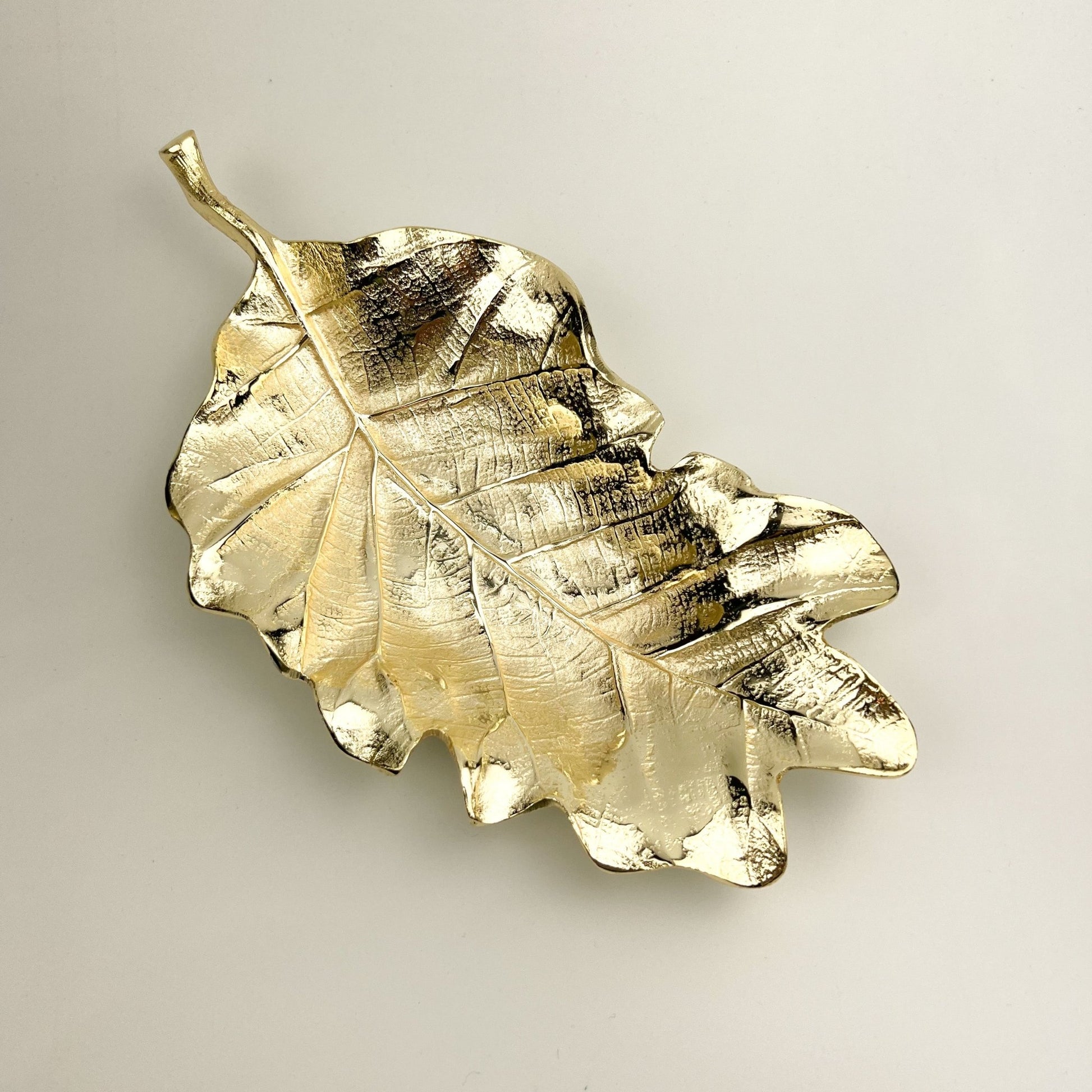 Elysian Gold Leaf Tray — sleek gold leaf shaped decorative tray with refined golden sheen for sideboards and coffee tables