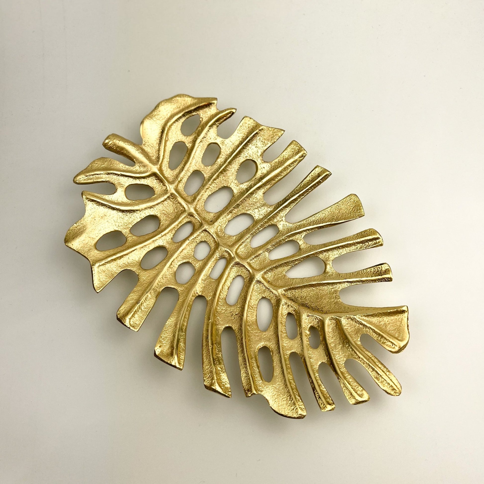 Solara Gold Leaf Tray — hand-finished gold leaf shaped tray with smooth radiant surface, gold decorative tray and table centrepiece UK